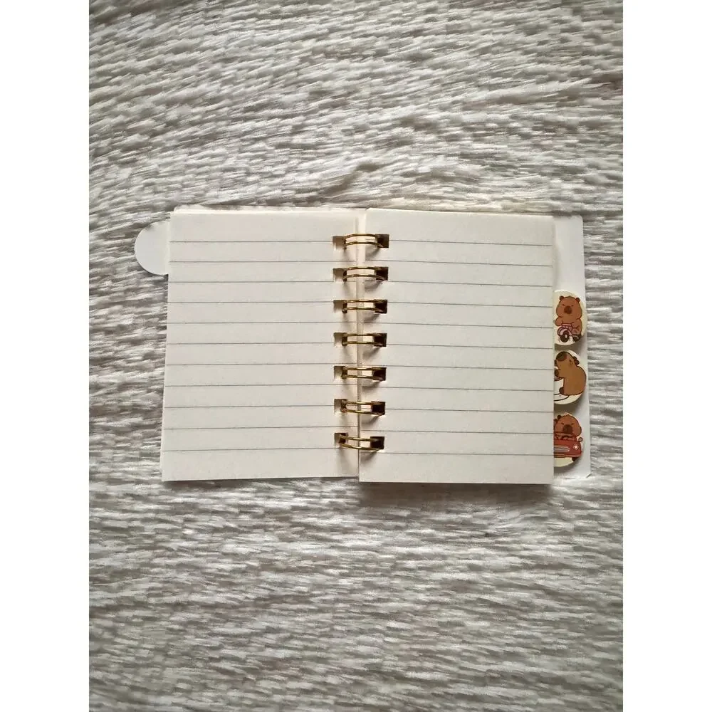 Capybara A6 spiral mini notebook with capybara in a red car design 4 dividers